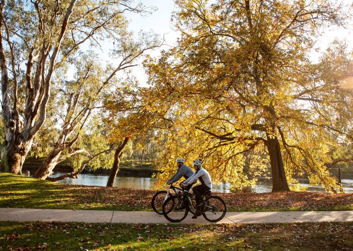 Noreuil Park, Albury Cyclists riding the foreshore path at Noreuil Park, Albury