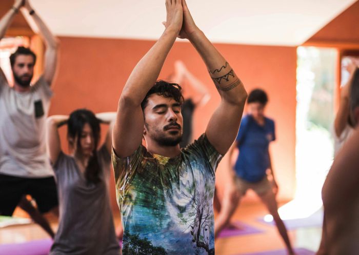 Happy Buddha Retreats, Wentworth Falls - Credit: Happy Buddha Retreats People enjoying a yoga class at Happy Buddha Retreats, Wentworth Falls