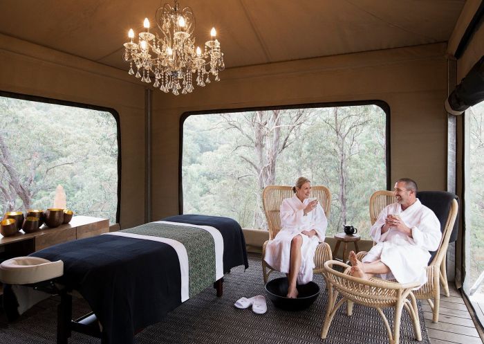 Spicers Sangoma Retreat, Bowen Mountain - Credit: Spicers Sangoma Retreat People enjoying tea in luxury massage tent at Spicers Sangoma Retreat, Bowen Mountain